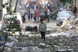 img_20240609_204358_4433311663221890663171-300x200 Palestinians inspect the remains of their homes and belongings after yesterday's Israeli massacre in the Al-Nuseirat refugee camp in central Gaza.