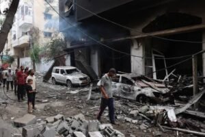 img_20240609_204358_4918427005299471655079-300x200 Palestinians inspect the remains of their homes and belongings after yesterday's Israeli massacre in the Al-Nuseirat refugee camp in central Gaza.